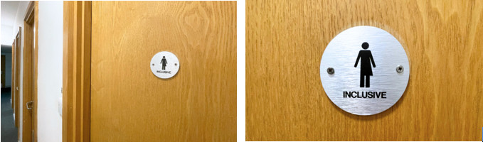 INCLUSIVE sign has been placed on the door of the gender-neutral toilets.