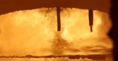 Flame appearance inside the furnace using a fuel blend of 80% natural gas and 20% Hydrogen.