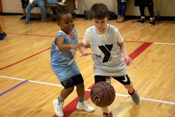 Children enjoy playing basketball.