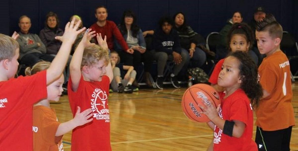 Children enjoy playing basketball.