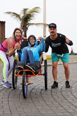 Volunteers of Solidarity Legs are running on the street